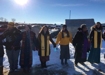 Surrounding the camp in prayer at Standing Rock
